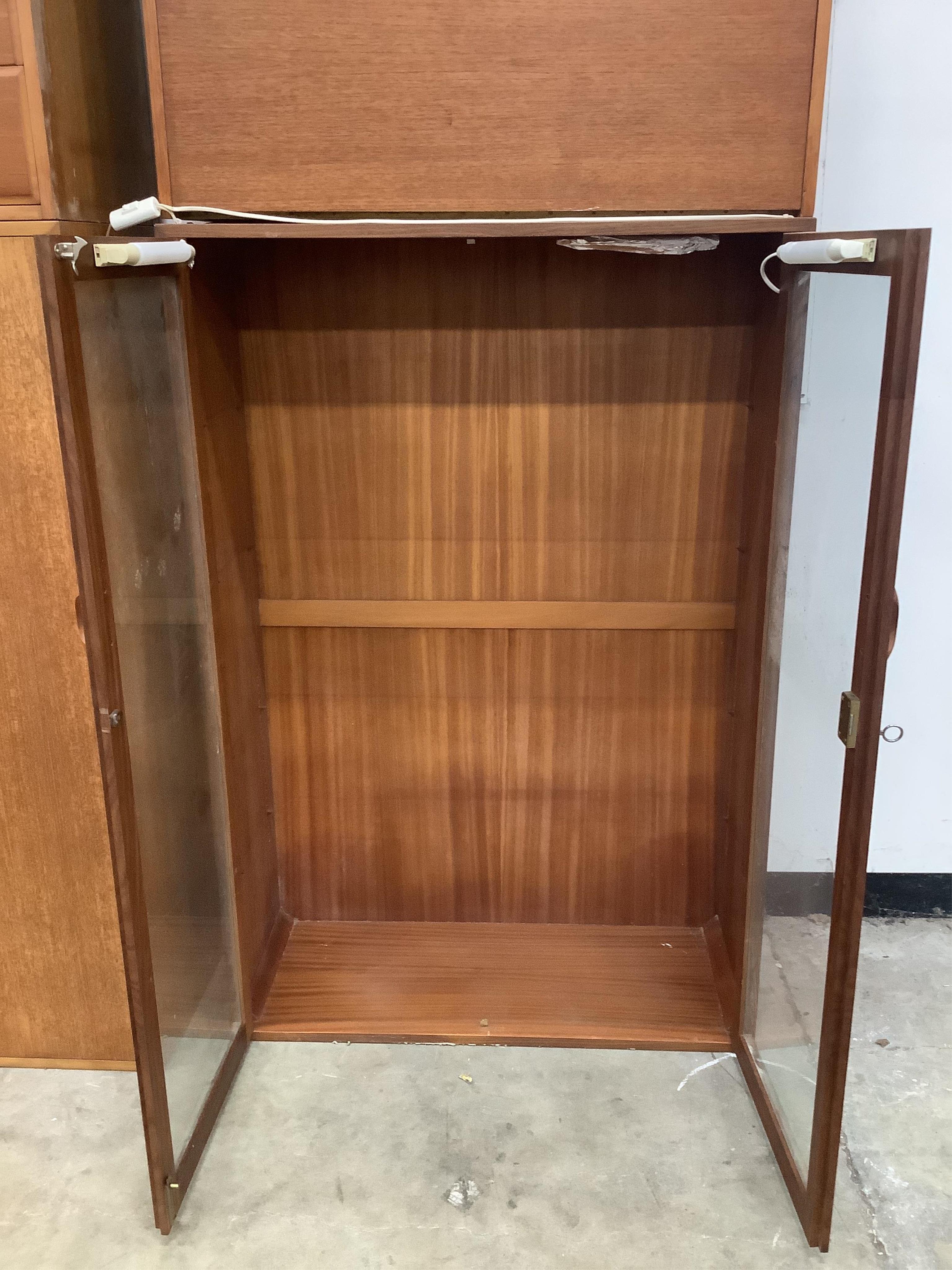 A Ladderax display cabinet, a large drop down bureau, a small drop down bureau and a storage cabinet. Condition - fair